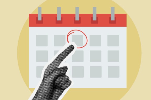Finger som peker på en kalender (istock) 